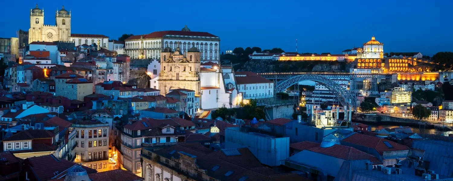 Famous view of Porto by night with moon, Portugal, Europe